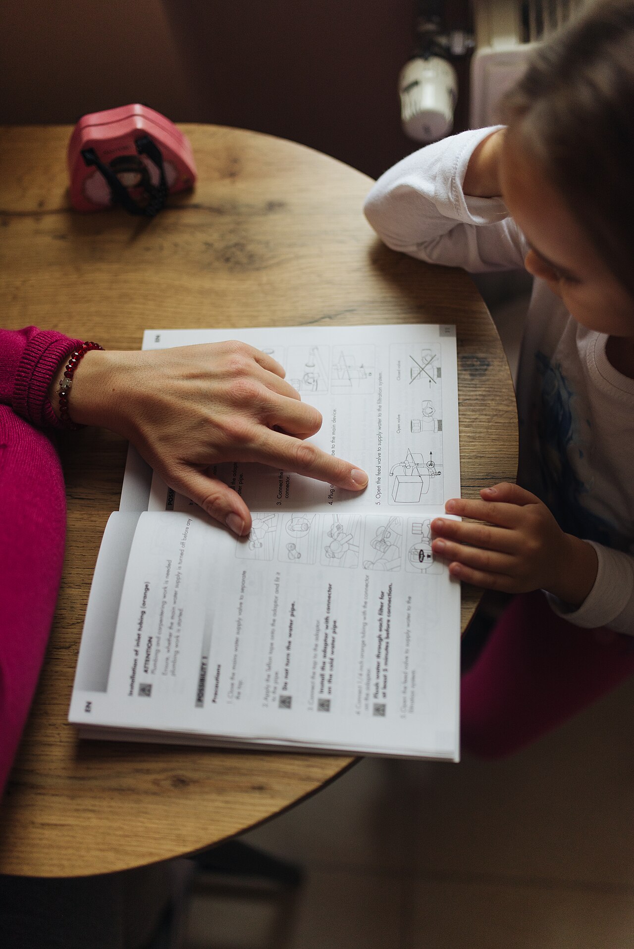 Parent and child learning together at home